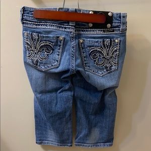 Light wash Miss Me crops